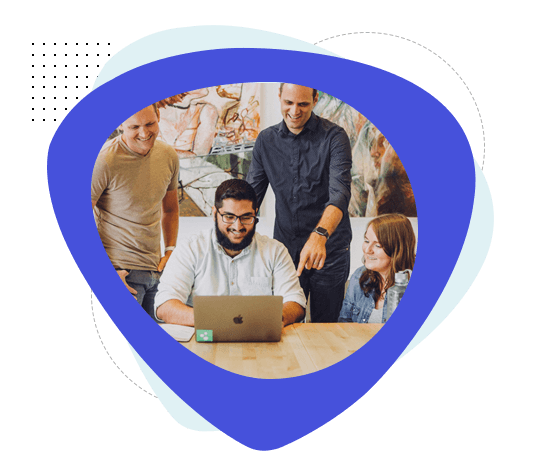 Employees in an office working, tracking time with TimeBee.